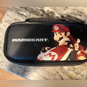 Nintendo Switch holder/bag. Can hold the switch and games.